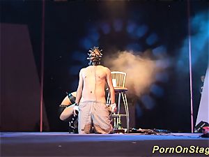 horny fetish syringe show on stage