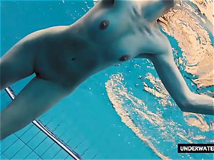 super-hot ginormous breasted teenager Lera swimming in the pool